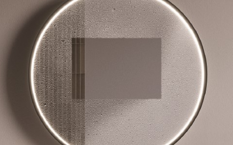 Mirror with demister pad